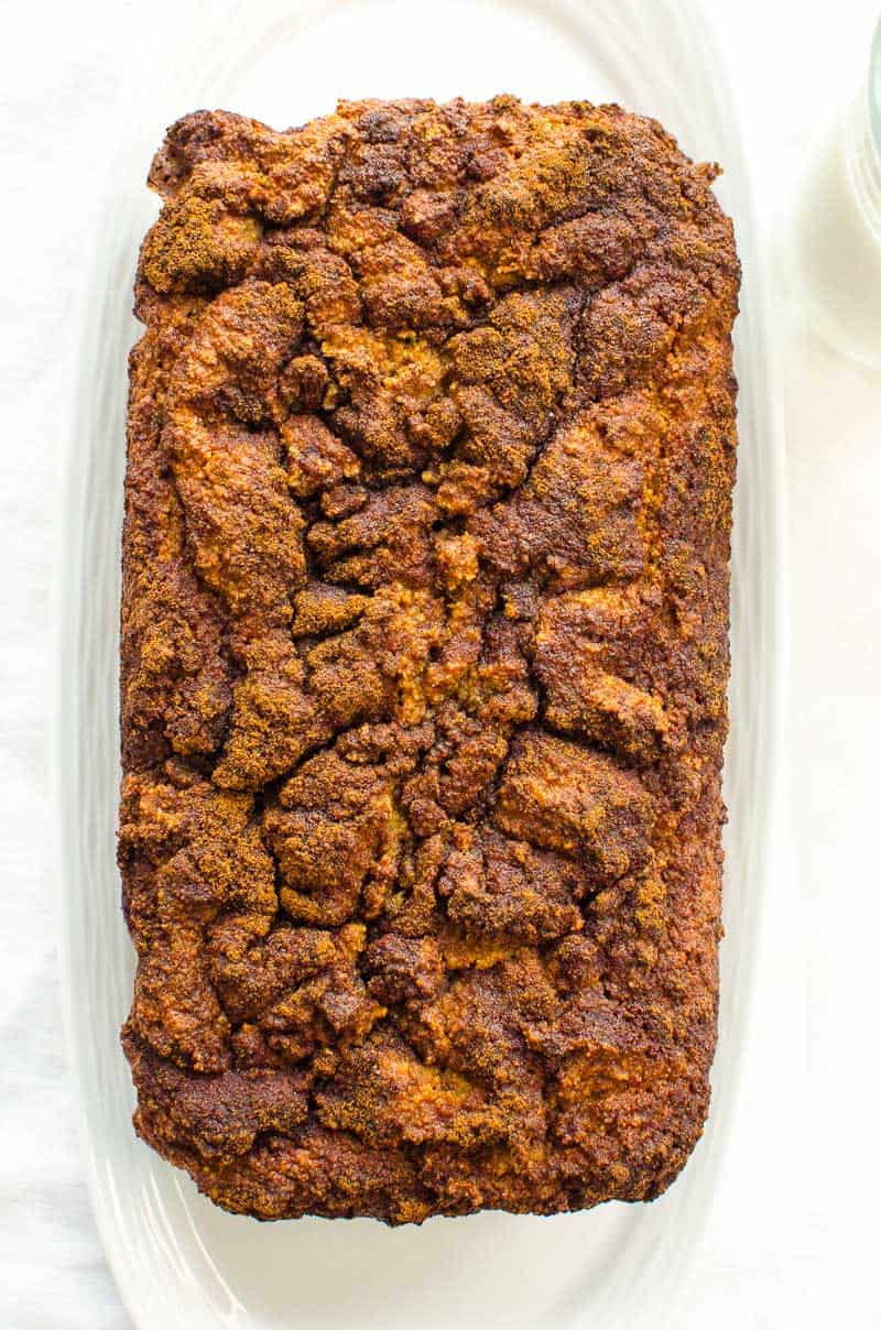 Cinnamon Quick Bread loaf on white platter