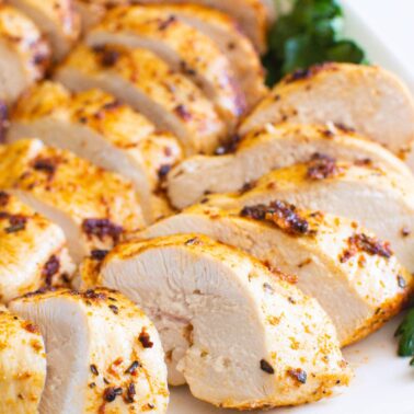 sliced air fryer chicken breast on a plate