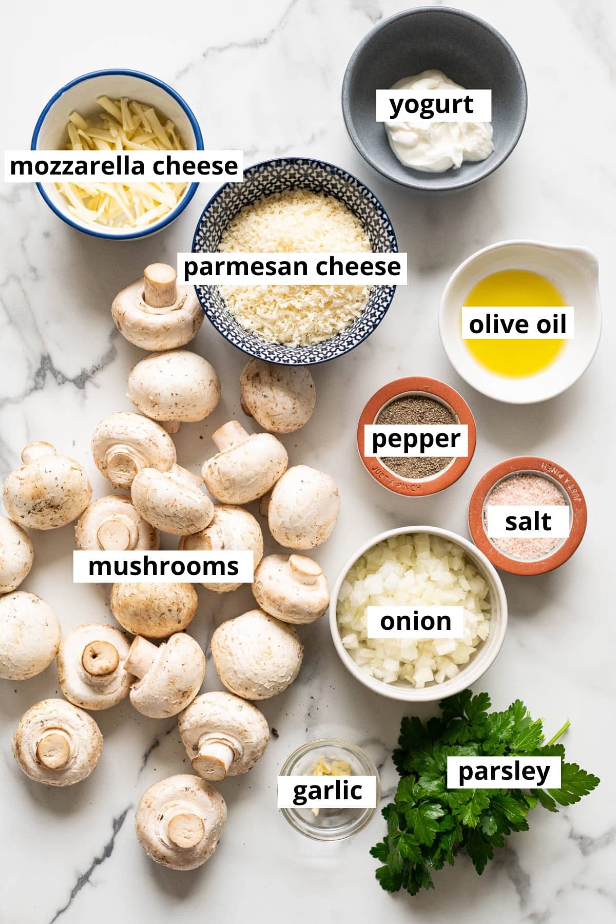Mushrooms, mozzarella cheese, parmesan cheese, yogurt, olive oil, onion, garlic, parsley, salt and pepper.