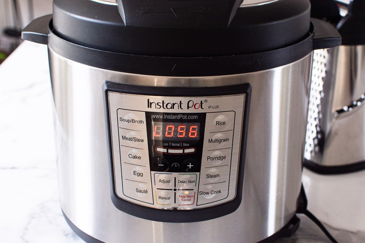 Instant Pot display says cook time finished 56 minutes ago.