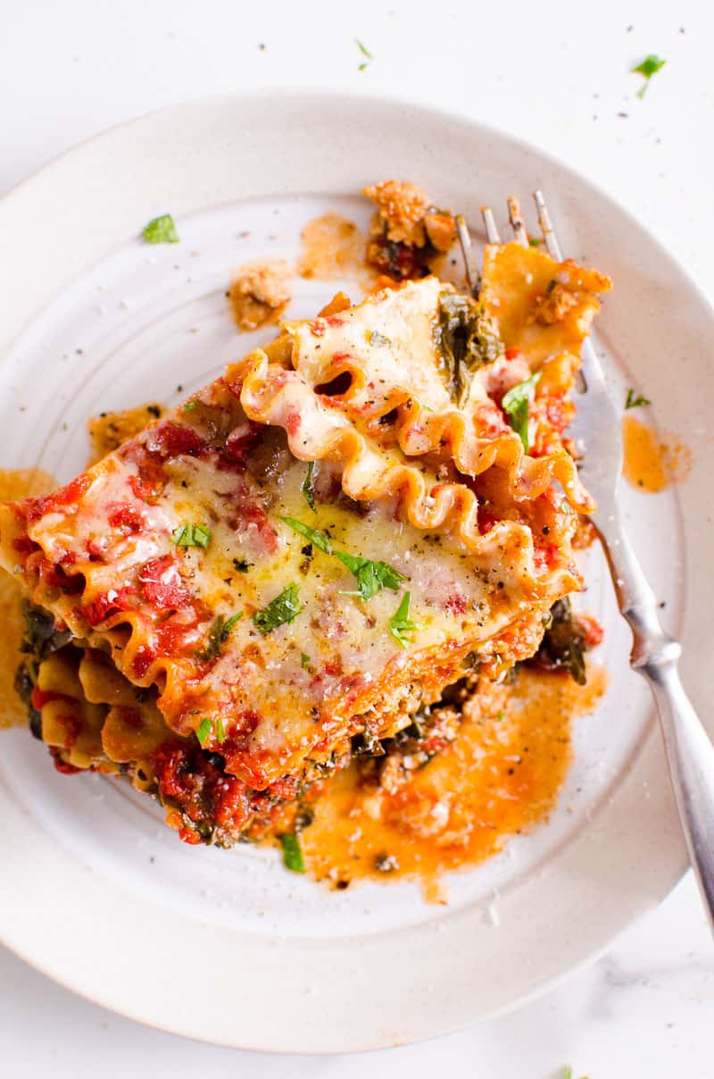 Instant Pot lasagna on a plate with a fork.